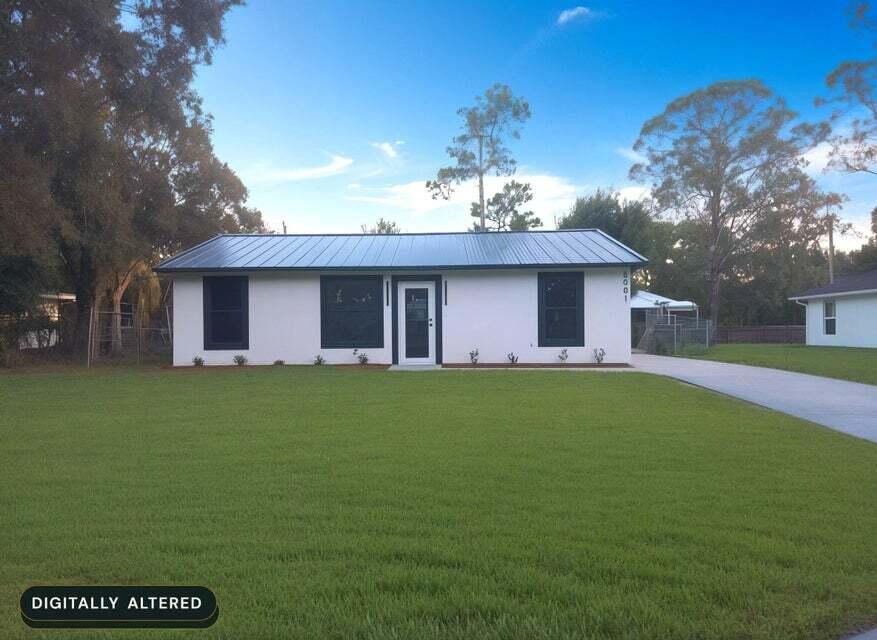 Photo of 8001 Hibiscus Road, Fort Pierce, FL 34951 (MLS # B26072034)