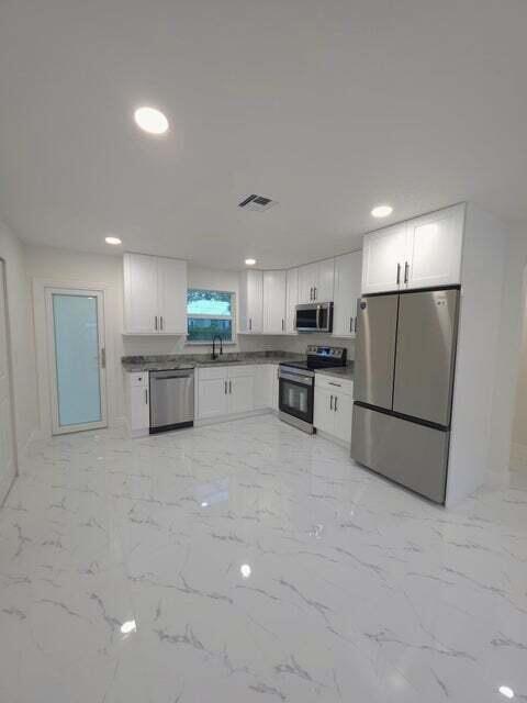 Photo of 8001 Hibiscus Road, Fort Pierce, FL 34951 (MLS # B26072034)
