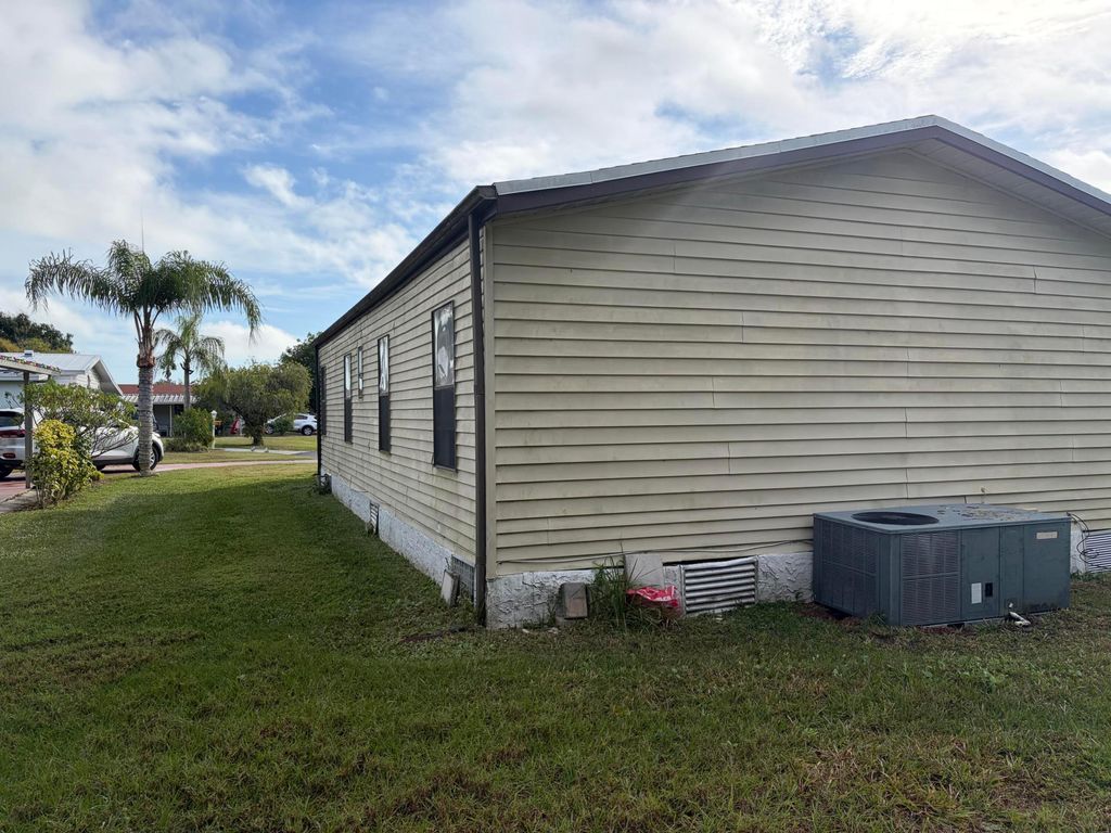 Photo of 202 Travis Cay Place #9, Fort Pierce, FL 34982 (MLS # R11149183)