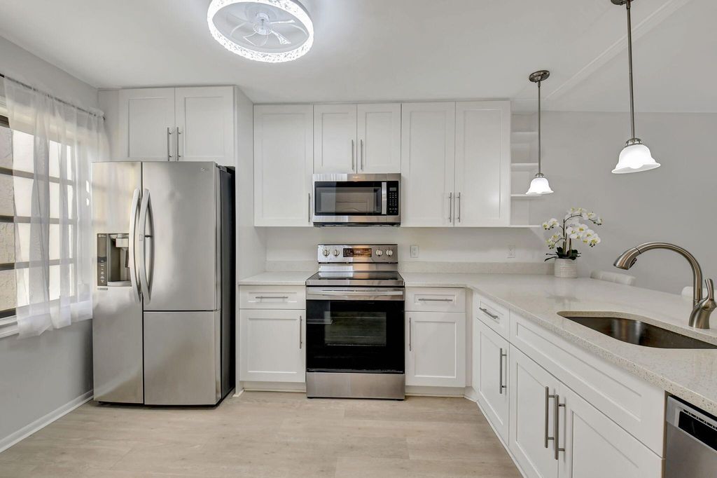 Photo of 8315 Casa Del Lago #F, Boca Raton, FL 33433 (MLS # R11119410)