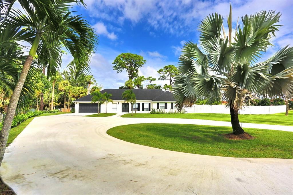 Photo of 5555 Gun Club Road, West Palm Beach, FL 33415 (MLS # R10670947)