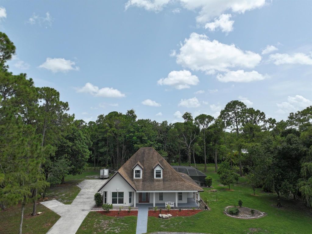 Photo of 16318 E E Pleasure Dr, Loxahatchee, FL 33470 (MLS # R11104185)