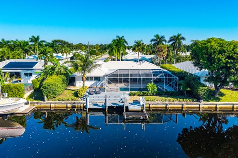 Photo of 744 Peachtree Lane, Boca Raton, FL 33486 (MLS # B26088668)