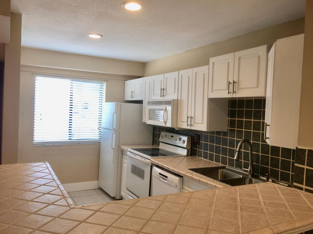 Photo of 139 Sparrow Drive #1a, Royal Palm Beach, FL 33411 (MLS # B26034650)