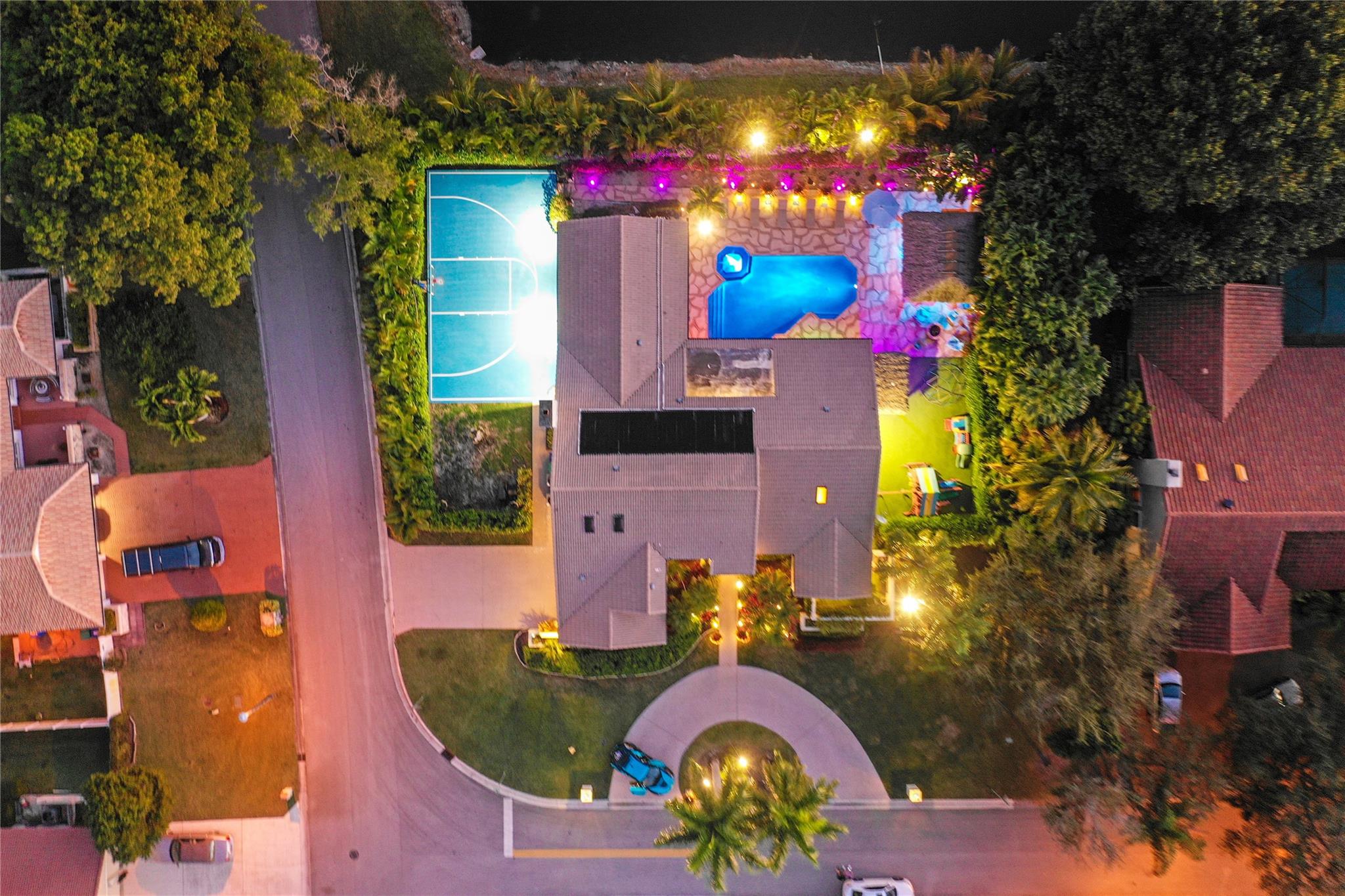 ABSOLUTELY STUNNING!! Hands down, the nicest home for rent on the market! If you're looking to live that "MTV CRIBS" lifestyle, you've just found the perfect place. This home has been completely renovated with nearly $500,000 in upgrades including smart home features. Home features soaring 23' ceilings and includes its own movie theater, basketball court, and a tropical paradise pool area that makes you feel like you're living at a resort. Enjoy a saltwater heated pool, two tiki huts, custom LED lighting throughout, an outdoor kitchen, custom stone walls and fireplace, smooth coated ceilings, and IMPACT WINDOWS throughout. With two driveways, a fully fenced backyard, and SO MUCH MORE, this home truly has it all. You better make an offer before... BOOM! SHE GONE!