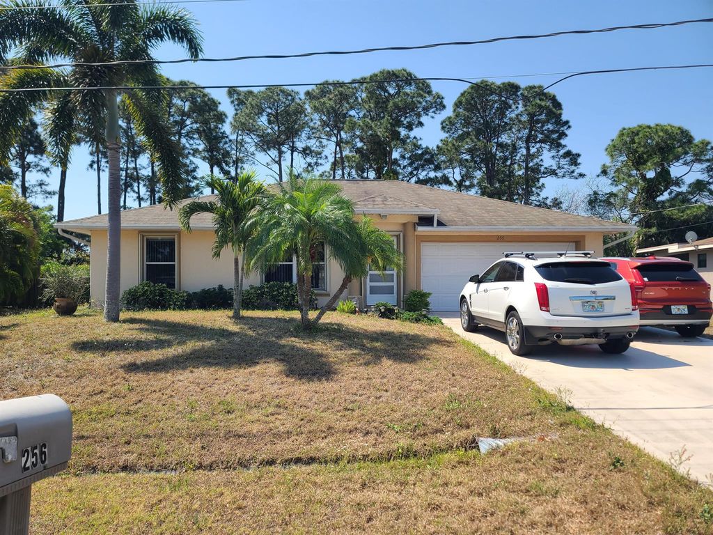 Photo of 256 SE Ray Avenue, Port Saint Lucie, FL 34983 (MLS # R10980137)