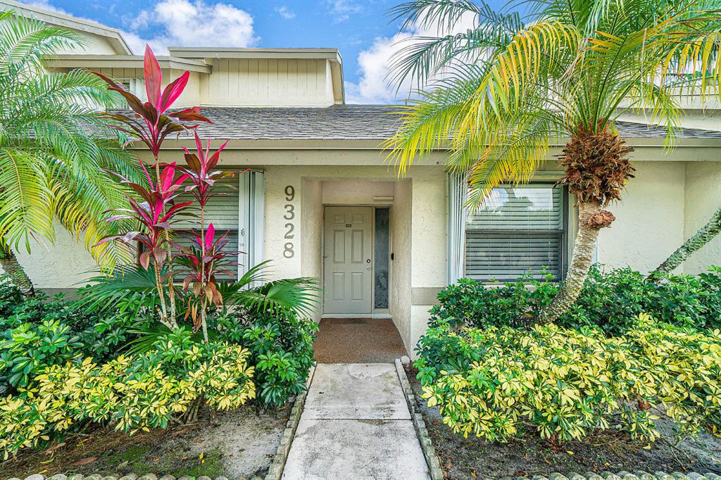 Available now for annual lease! This 2 bedroom 2 bathroom lakefront villa feels like it's still new! The spacious open concept features an updated gourmet kitchen with ceramic tile and wood laminate floors throughout. The oversized master bedroom includes a large walk in closet with a spacious bathroom. Laundry closet is also conveniently located inside in between both bedrooms. Boca Ridge is a gate guarded community located conveniently between Lyons Rd and US441 on Glades Rd.
