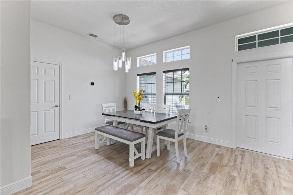 Photo of 2668 SW Fair Isle Road, Port Saint Lucie, FL 34987 (MLS # R10972222)
