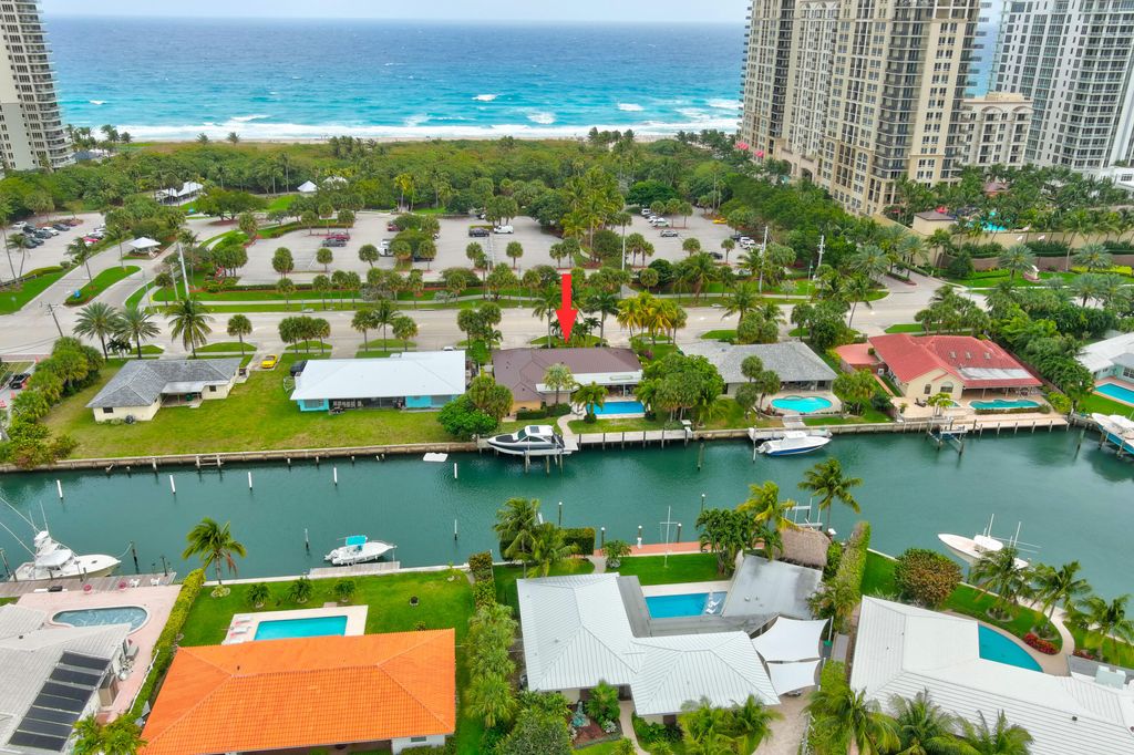 Photo of 3855 N Ocean Drive, Riviera Beach, FL 33404 (MLS # R10787338)