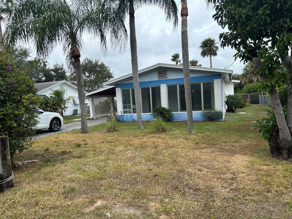 Photo of 1791 NE Mango Terrace, Jensen Beach, FL 34957 (MLS # R10936131)