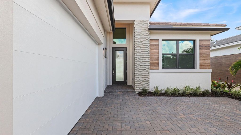 Photo of 13924 Vivant Drive, Palm Beach Gardens, FL 33412 (MLS # F10543933)