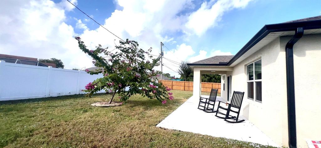 Photo of 341 SW Ridgecrest Drive, Port Saint Lucie, FL 34953 (MLS # R11045760)