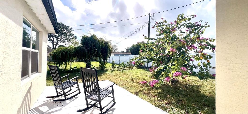 Photo of 341 SW Ridgecrest Drive, Port Saint Lucie, FL 34953 (MLS # R11045760)