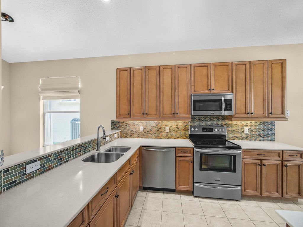 Photo of 624 SW Saint Thomas Cove, Port Saint Lucie, FL 34986 (MLS # R11108265)