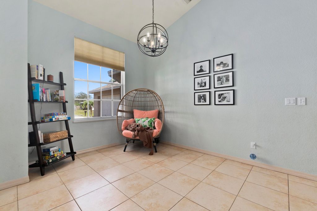 Photo of 1598 SW Janette Avenue, Port Saint Lucie, FL 34953 (MLS # R10781396)