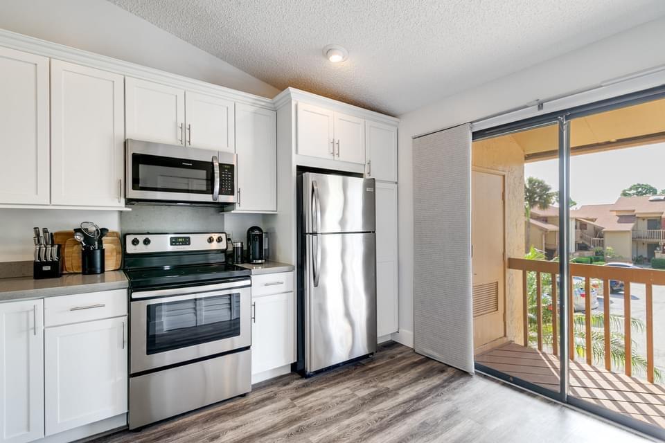 SHEFFIELD WOODS AT WELLINGTON CONDO - Residential