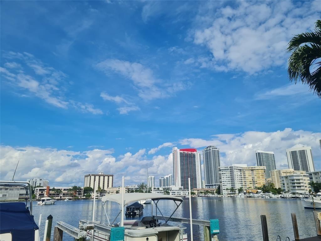 Photo of 300 Golden Isles Dr #104, Hallandale Beach, FL 33009 (MLS # F10533671)