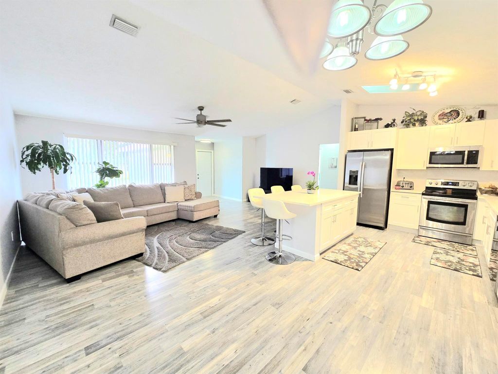 Photo of 749 SE Atlantus Avenue, Port Saint Lucie, FL 34983 (MLS # R11089166)