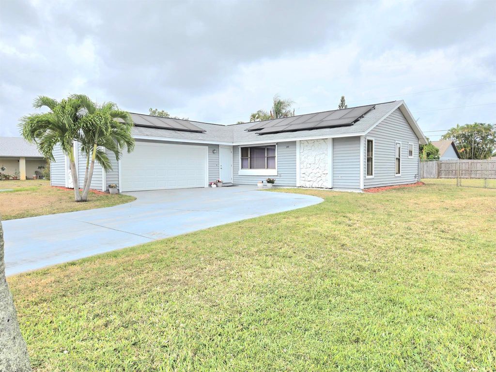 Photo of 749 SE Atlantus Avenue, Port Saint Lucie, FL 34983 (MLS # R11089166)