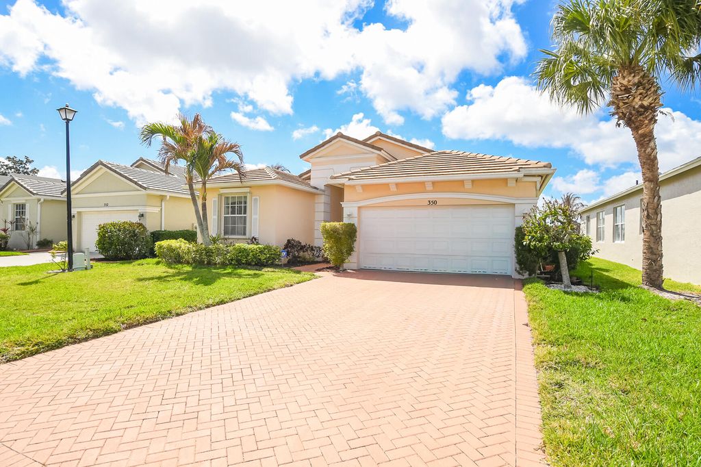 Photo of 350 SW Lake Forest Way, Port Saint Lucie, FL 34986 (MLS # R11169891)