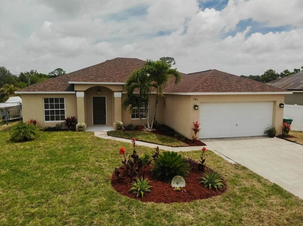 Photo of 101 SW Glenwood Drive, Port Saint Lucie, FL 34984 (MLS # R10797075)