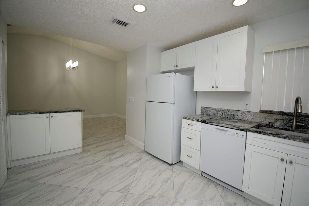 Photo of 9665 Riverside Drive #9I, Coral Springs, FL 33071 (MLS # F10528702)