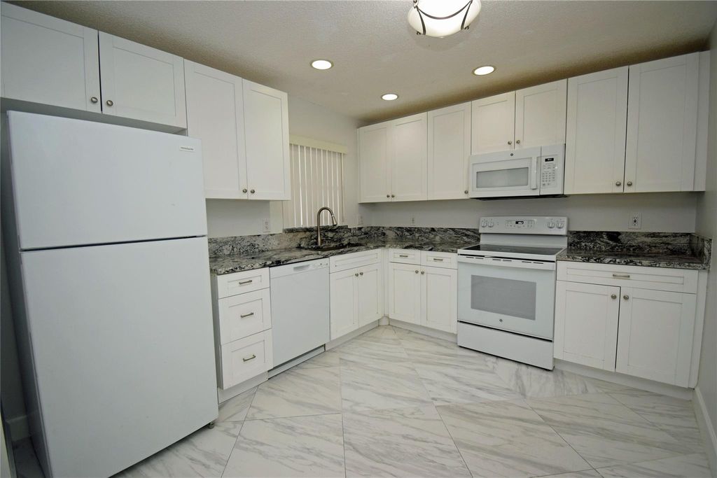 Photo of 9665 Riverside Drive #9I, Coral Springs, FL 33071 (MLS # F10528702)