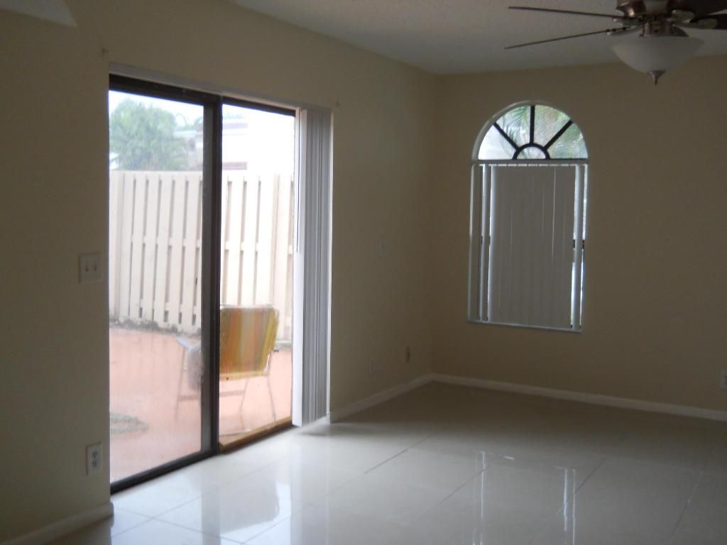 Photo of 3955 Village Drive #A, Delray Beach, FL 33445 (MLS # R11152587)