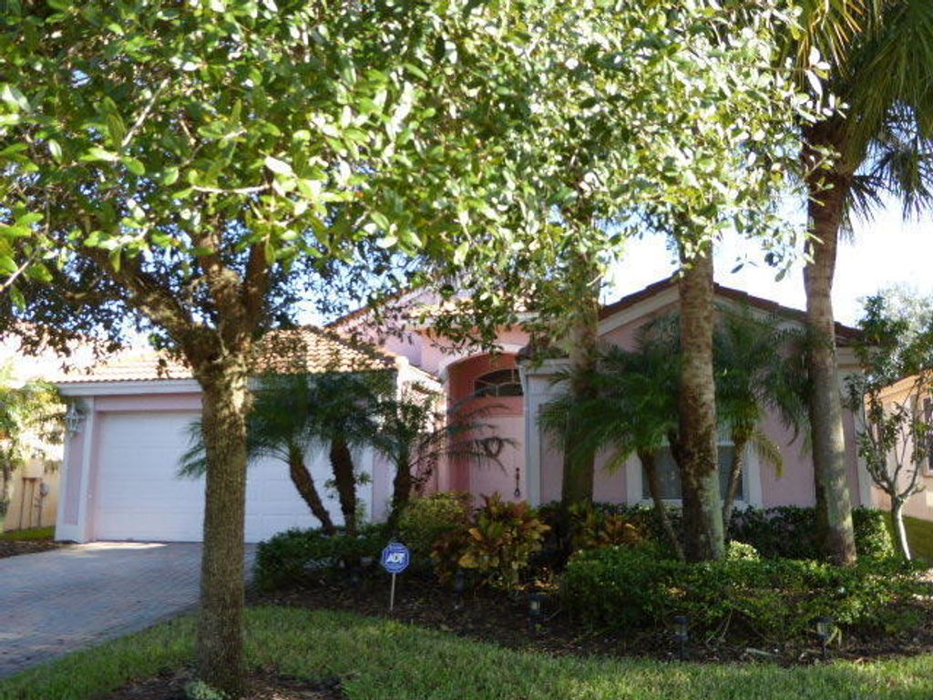 Photo of 830 SE Westminster Place, Stuart, FL 34997 (MLS # R10966702)