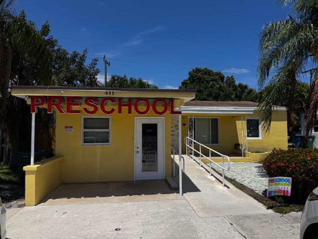 Photo of 411 E Commercial Boulevard, Oakland Park, FL 33334 (MLS # B26017705)