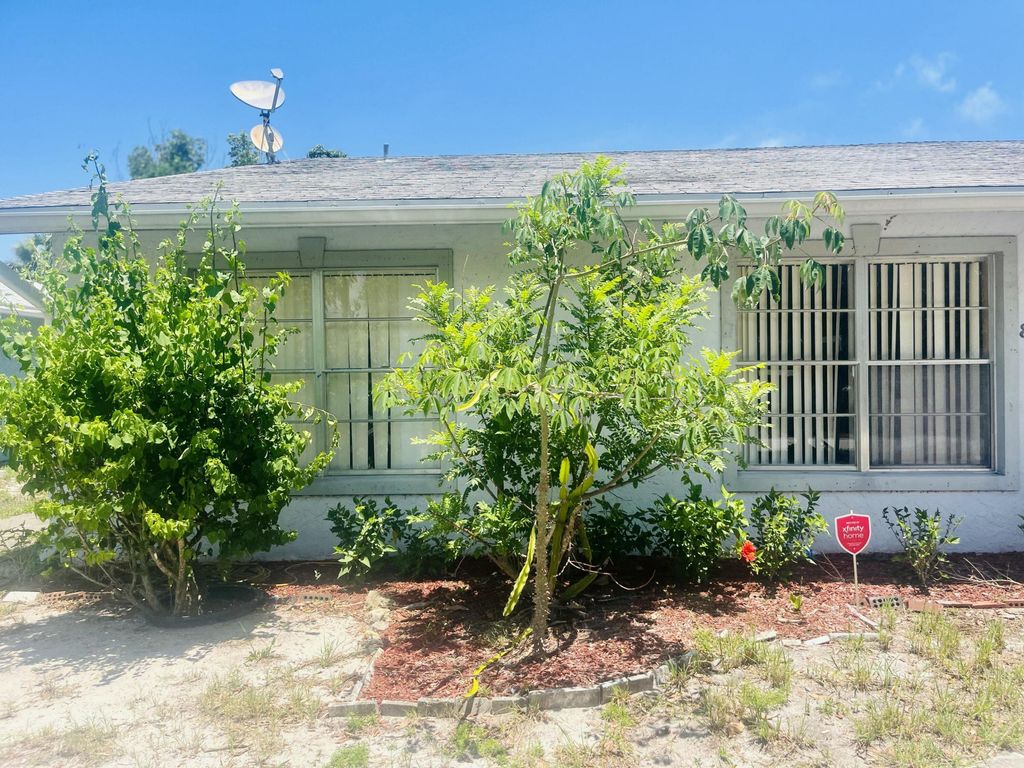 Photo of 8905 SE Sandy Lane, Hobe Sound, FL 33455 (MLS # B26029688)
