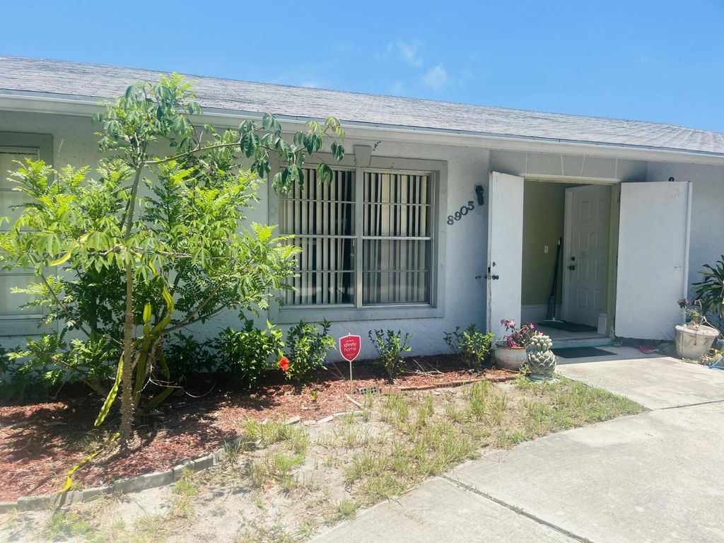 Photo of 8905 SE Sandy Lane, Hobe Sound, FL 33455 (MLS # B26029688)
