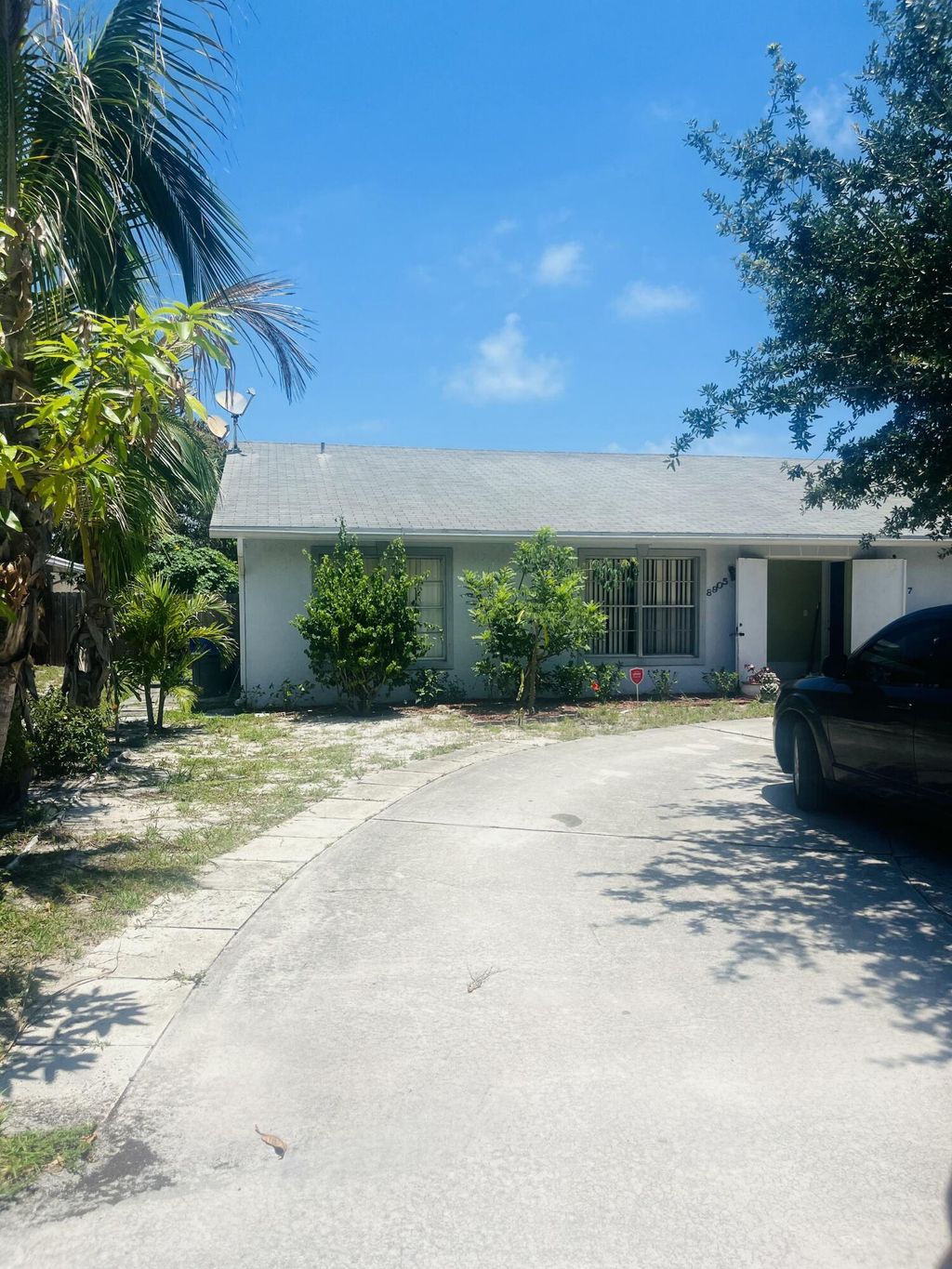 Photo of 8905 SE Sandy Lane, Hobe Sound, FL 33455 (MLS # B26029688)