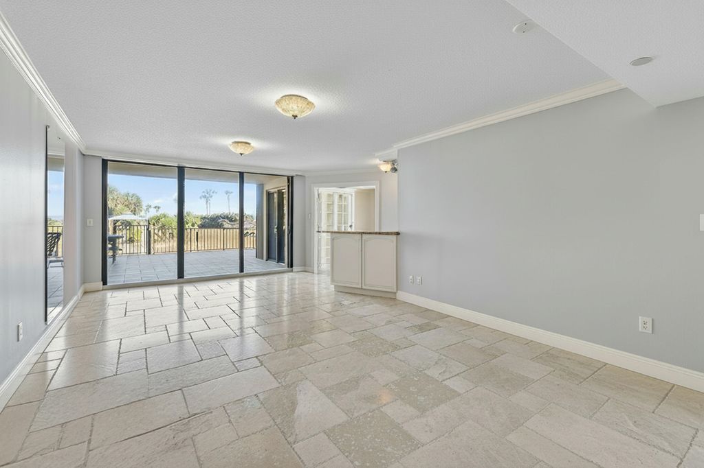 Photo of 100 Ocean Trail Way #101, Jupiter, FL 33477 (MLS # R11161596)