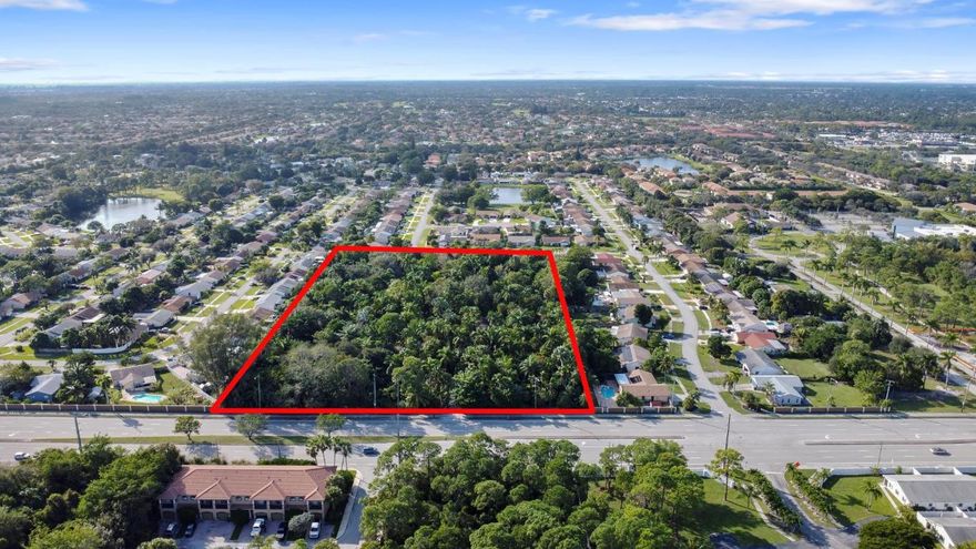 Two lots totaling 5.55 acres with over 400 feet of direct frontage on Military Trail. This property has potential development of up to 50 units with zoning district change. There is a house & swimming pool on the property. Survey is attached along with a referral form to the Palm Beach County Planning Division for further information on potential property development.