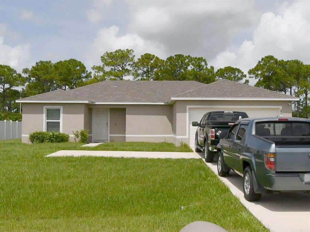 Photo of 2514 SW Savage Boulevard, Port Saint Lucie, FL 34953 (MLS # F10504427)