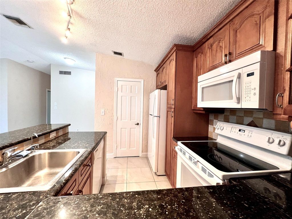 Photo of 22303 Misty Woods Way, Boca Raton, FL 33428 (MLS # F10533116)