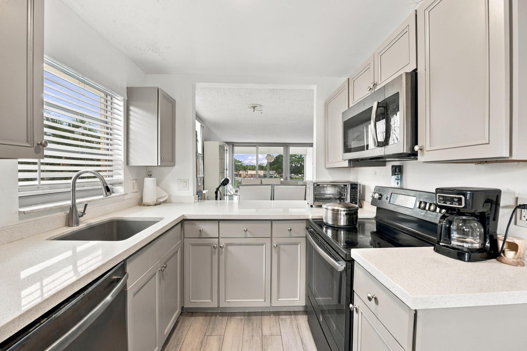 Photo of 5860 NW 64TH Avenue #201, Tamarac, FL 33319 (MLS # B26081962)
