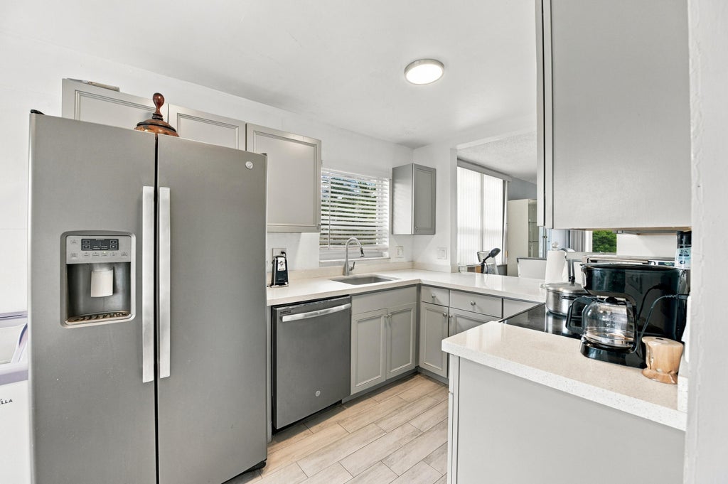 Photo of 5860 NW 64TH Avenue #201, Tamarac, FL 33319 (MLS # B26081962)