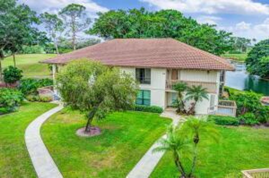 Photo of 420 Brackenwood Lane S, Palm Beach Gardens, FL 33418 (MLS # R11054071)