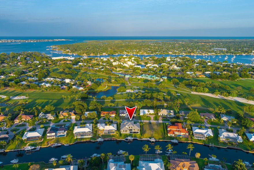 Experience luxurious waterfront living in this stunning 2022-built home in the Yacht & Country Club of Stuart. With ocean access, a private dock, and a 16K lb boatlift, this 2-story residence offers high-end amenities and exquisite finishes. Your Control4 Smart Home features 4 bedrooms, an office, a media room, bar, and 3 bathrooms across two levels. The expansive outdoor area boasts an Infinity pool, spa, and summer kitchen for al fresco dining. This wonderful community rarely sees new waterfront homes on the market, with only six built after 2010 ever listed. The newly renovated golf course attracts top golfers, and the Yacht & Country Club offers a full social calendar year-round. Enjoy private member dining and various sports amenities. Memberships available but not mandatory.