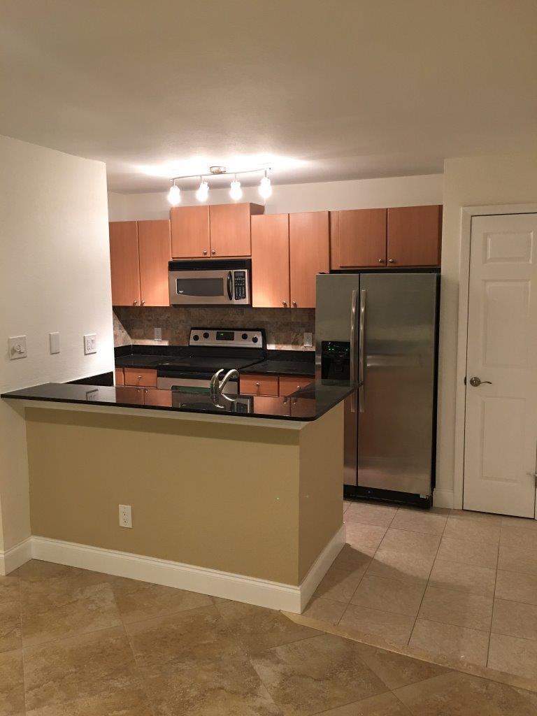 Photo of 1865 PALM COVE Boulevard #9-104, Delray Beach, FL 33445 (MLS # B26073669)