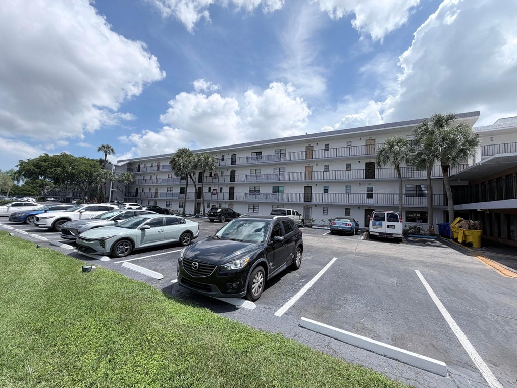 Photo of 9370 SW 8TH Street #214, Boca Raton, FL 33428 (MLS # B26078152)
