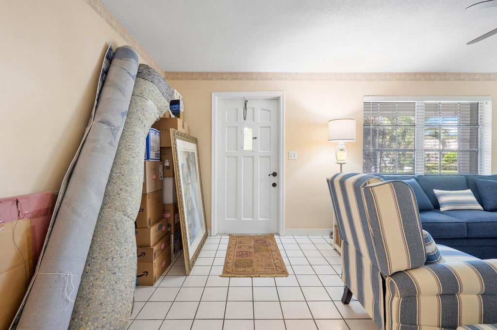 Photo of 11 Sailfish Lane, Ocean Ridge, FL 33435 (MLS # B26012698)
