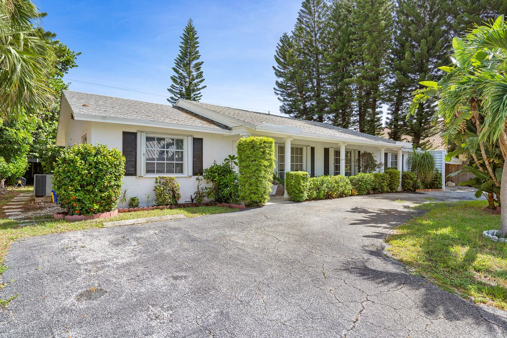 Photo of 11 Sailfish Lane, Ocean Ridge, FL 33435 (MLS # B26012698)