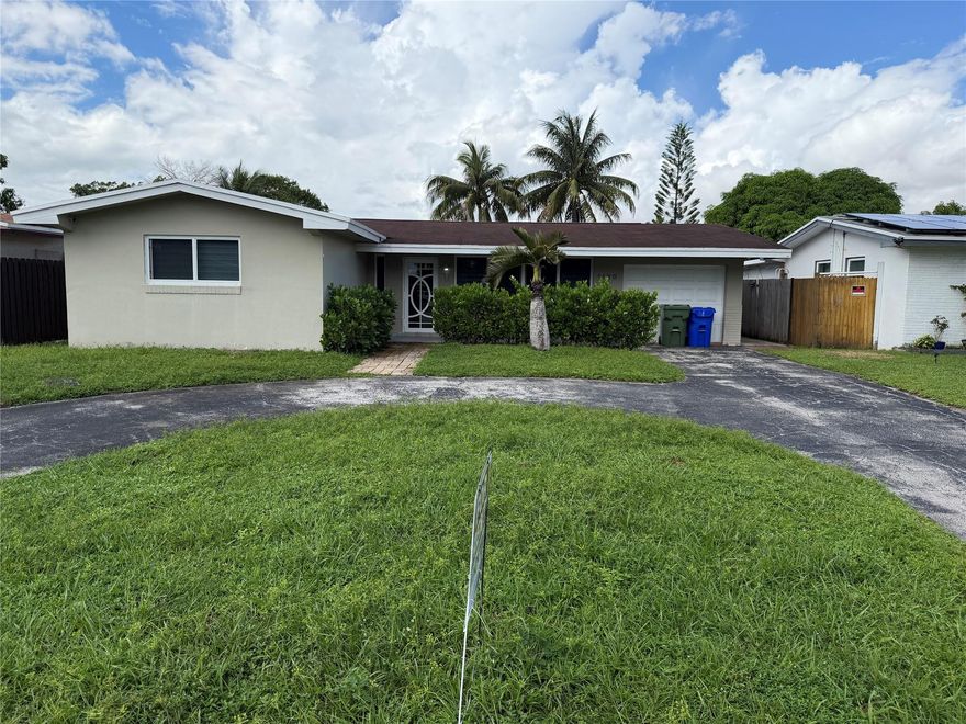 Spacious 4-bedroom, 2-bathroom home in Pembroke Pines featuring tile floors throughout, a modern kitchen with stainless steel appliances, and updated bathrooms. Bright open layout with large living areas. Enjoy a spacious backyard with lake views, perfect for relaxing or entertaining. Conveniently located near schools, shopping, dining, and major highways.