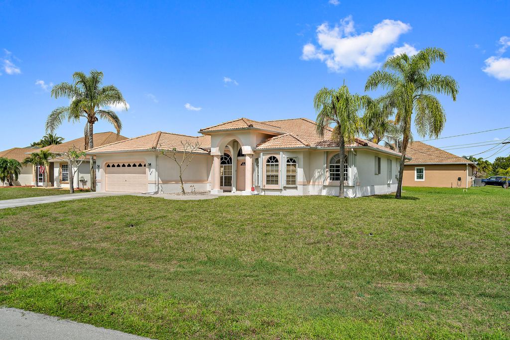 Photo of 601 SW Saragossa Avenue, Port Saint Lucie, FL 34953 (MLS # R10798798)