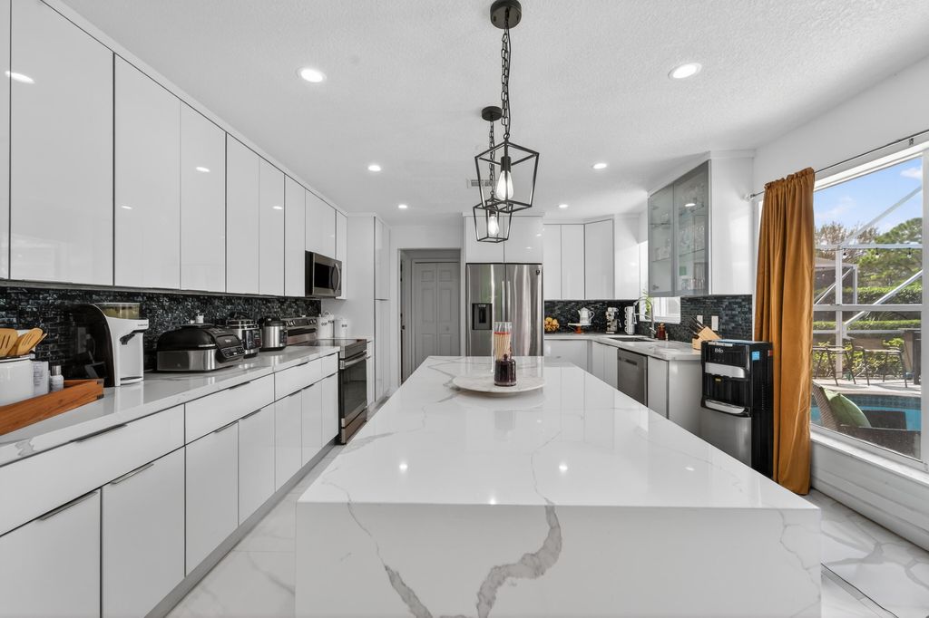 Photo of 200 Trails End, Greenacres, FL 33413 (MLS # R11169324)