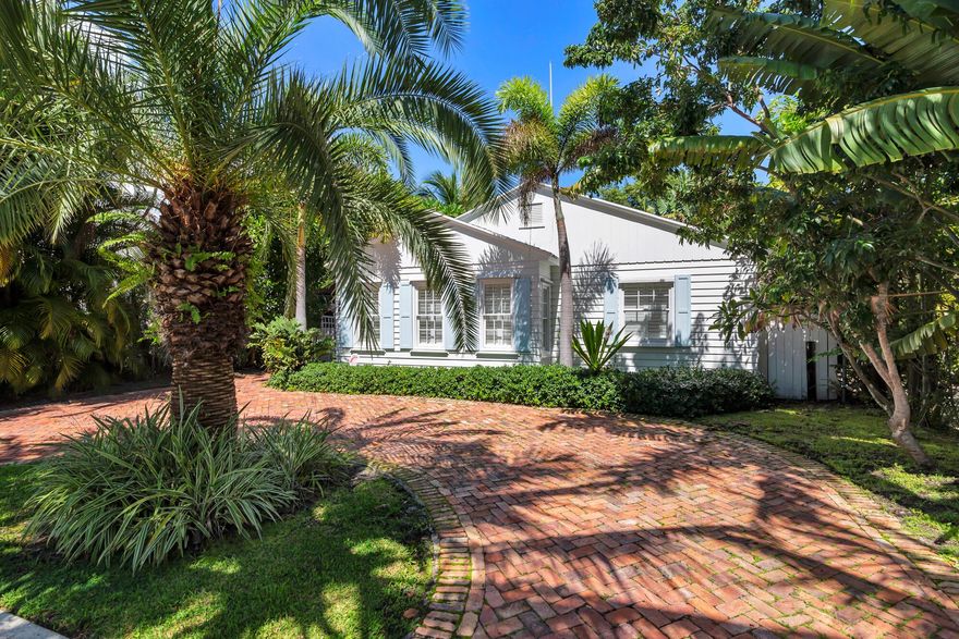 Classic Key West style cottage with pool and guest house in the heart of Old Northwood.  This lovingly restored and updated private compound features a 2 bedroom, 1 bath main house with a spacious 1 bedroom, 1 bath guest cottage separated by a tropically landscaped courtyard complete with gas heated pool and spa. Historic Old Florida details include gleaming original hardwood floors, crown moulding and an elegant fireplace with built in shelving. You enter into a sunny Florida Room with plantation shutters and French Doors to the living room. The spacious eat-in kitchen features white shaker cabinetry with poured concrete countertops, farmhouse sink, stainless steel appliances including a Sub-Zero refrigerator, pot-filler, built-in microwave, and gas range for the chef.