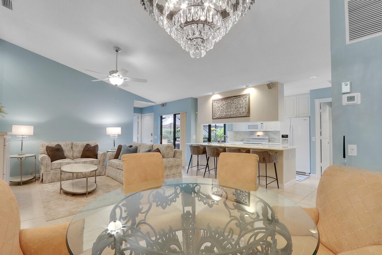 This fully furnished, charming villa is nestled in the most private and cozy corner of Jefferson Corners. Lush surroundings and friendly neighbors make living here your own paradise. This home has had many recent beautiful upgrades. They include NEW roof, AC, two comfort height toilets, water filtration system, ice maker, dishwasher, wine cooler, granite kitchen and ''both'' bathroom countertops, sinks, faucets, cabinetry hardware, two fans, painted inside as well as painted screen enclosure, landscaping inside courtyard with drip system, and new landscaping around the outside of screened patio. This home also feels light and airy with a lot of mirrored and glass built-in cabinets. The amenities include a large heated pool, tennis courts, and golf club/course. Come see this gem today.